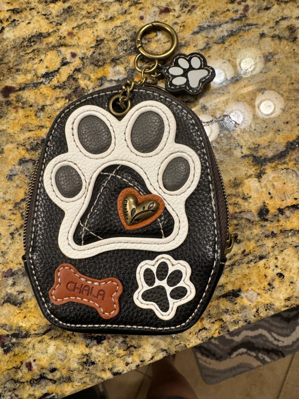 Chala Black and White Paw Print mini coin purse with Brown Accents